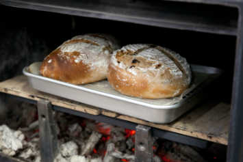 cuisiner dans l'anterieur de la poele  bois